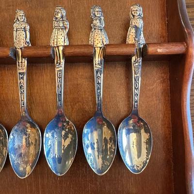 SOUVENIR SPOONS AND A WALL HUNG HOLDER