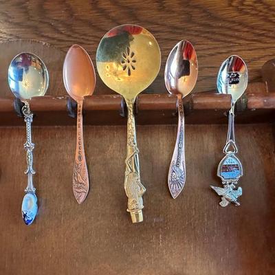 SOUVENIR SPOONS AND A WALL HUNG HOLDER