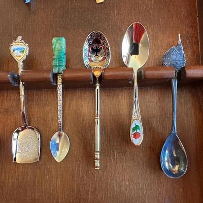 SOUVENIR SPOONS AND A WALL HUNG HOLDER