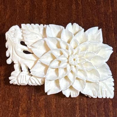 3 carved bone pins
