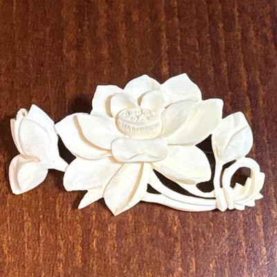 3 carved bone pins