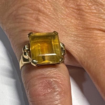 10K ring with large yellow stone (size 7)