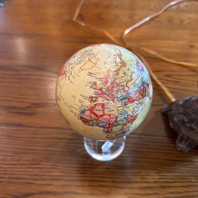 CLAY POT SIGNED JOSE SOSA, FLOATING GLOBE AND A SMALL LAMP