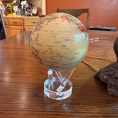 CLAY POT SIGNED JOSE SOSA, FLOATING GLOBE AND A SMALL LAMP