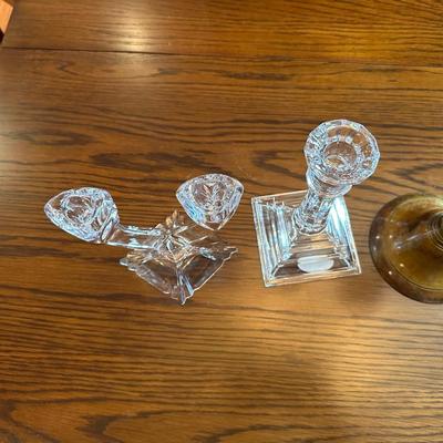 2 PAIRS OF CRYSTAL CANDLESTICKS AND 1 BRASS ONE