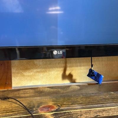 LG 49" LED SMART TV WITH REMOTE, WALL MOUNT AND STAND