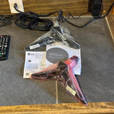 LG 49" LED SMART TV WITH REMOTE, WALL MOUNT AND STAND