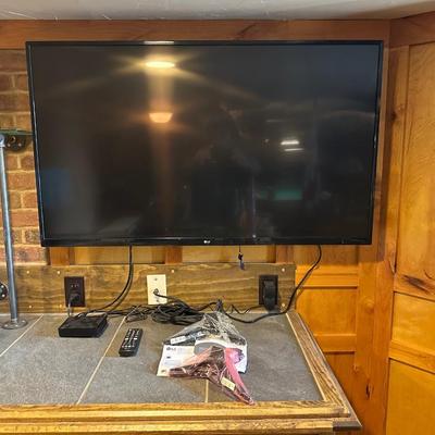 LG 49" LED SMART TV WITH REMOTE, WALL MOUNT AND STAND