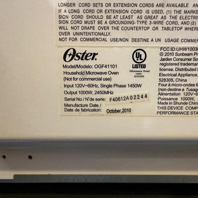 OSTER 1000W MICROWAVE AND PAPER TOWEL HOLDER