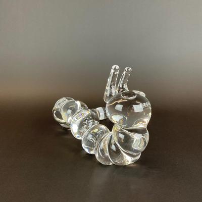 Sale Photo Thumbnail #22: Peter Yenawine ( American , b. 1944 ) for Steuben glass caterpillar sculpture, designed in 1970, signed “Steuben” to underside at end of tail. Provenance from a 177 75th Street Collection.
Measurements:
10” in length, 6.5” in height, 2.5” in wid
