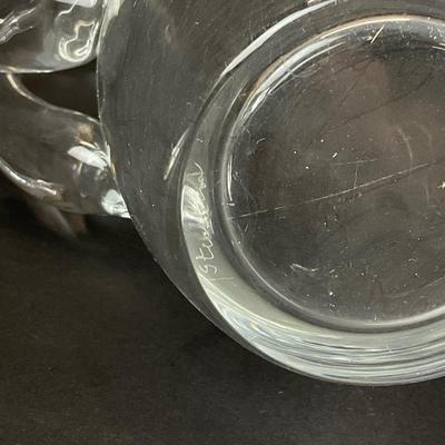 Sale Photo Thumbnail #917: designed by Lloyd Atkins model # 8077 comes with split handle includes stir stick. Pitcher does have scratches at bottom, please refer to photos.
Measurements:
10” in height, 3.5” in diameter
Handle sticks out 1.75”