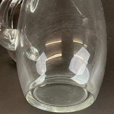 Sale Photo Thumbnail #918: designed by Lloyd Atkins model # 8077 comes with split handle includes stir stick. Pitcher does have scratches at bottom, please refer to photos.
Measurements:
10” in height, 3.5” in diameter
Handle sticks out 1.75”