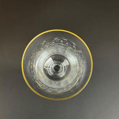 Sale Photo Thumbnail #924: The set has etched animals and gold trim at top. Discontinued 1947 - 1961
The gold trim is wearing off. All glasses have no chips or flea bites.
Measurements:
7.75” in height, 2.75” in diameter