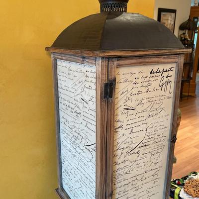 Candle lantern on pedestal