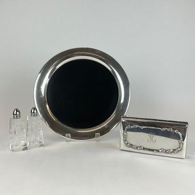 Sale Photo Thumbnail #949: Reed & Barton Silverplate Serving tray, a Rodger burrows box, and a salt and pepper shakers
Measurements:
Plate is 12” in diameter
Box is 6.5” in width, 3.5” in depth, 2” in height