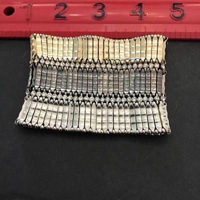 Sale Photo Thumbnail #73: Beautiful, silver, gunmetal and gold tone stretchy bracelet with rhinestones. Please see attached photos.