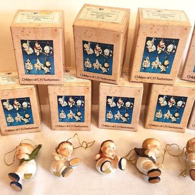 Lot #226 Lot of 10 Boxed "Babies Out to Dry" Ornaments - so cute