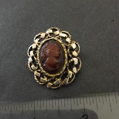 Vintage root beer, cameo brooch