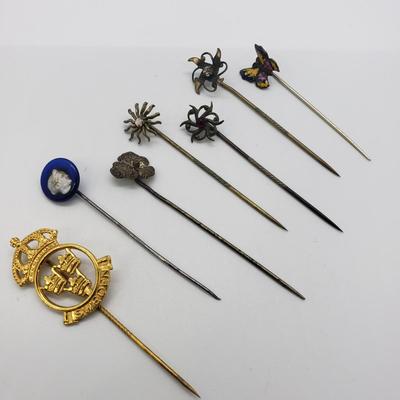 LOT 60: Collection of Stick Pins; Glass Cameo, Enamel Butterfly & More