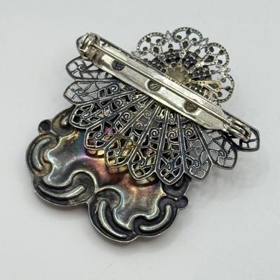 LOT 82: Clay Floral Pin & Pendant, Sarah Coventry Apple Pin, JJ Sailboat Brooch & More