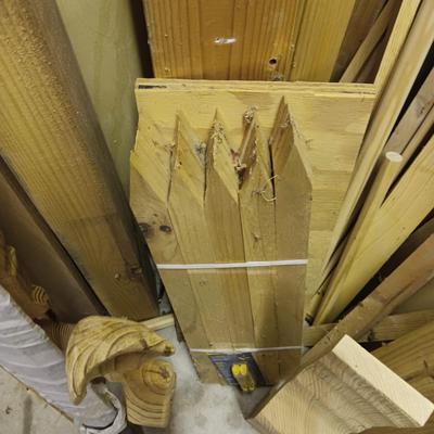 A LARGE PILE OF SCRAP LUMBER