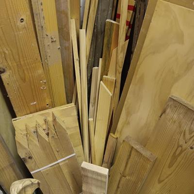 A LARGE PILE OF SCRAP LUMBER