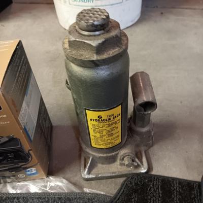 NEW AND LIKE NEW AUTO FLOOR MATS, BATTERY CHARGER MAINTAINER, BOTTLE JACK AND A COMPRESSOR