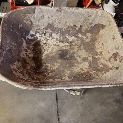 PAIR OF FOLDING METAL ADJUSTABLE HEIGHT SAW HORSES AND A WHEEL BARROW