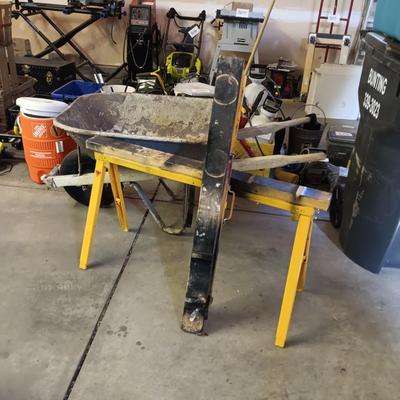 PAIR OF FOLDING METAL ADJUSTABLE HEIGHT SAW HORSES AND A WHEEL BARROW
