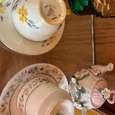 Tea, cups, and pitchers