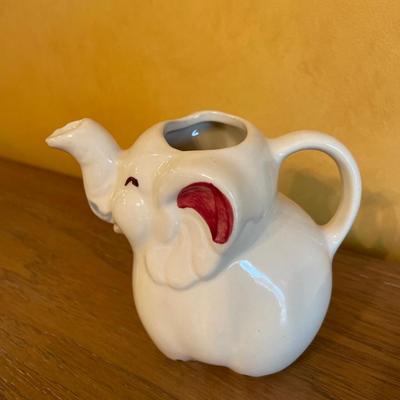 Tea, cups, and pitchers