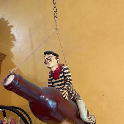 Parisian flying on a wine bottle