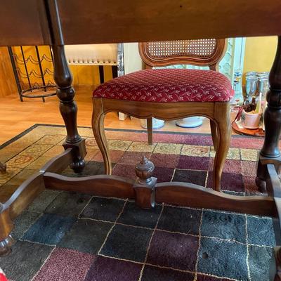 Dark table with wicker back chairs