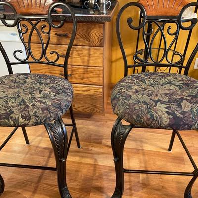 4 bar stools with floral pattern seats