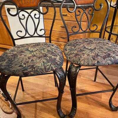 4 bar stools with floral pattern seats