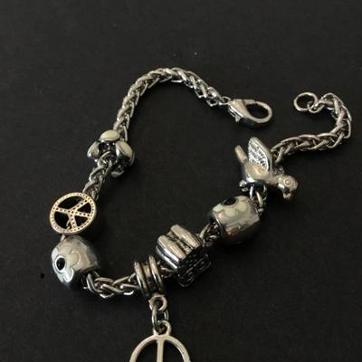 Super cute very nice free bird + peace charm bracelet. Very nice quality.