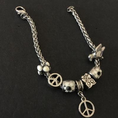 Super cute very nice free bird + peace charm bracelet. Very nice quality.