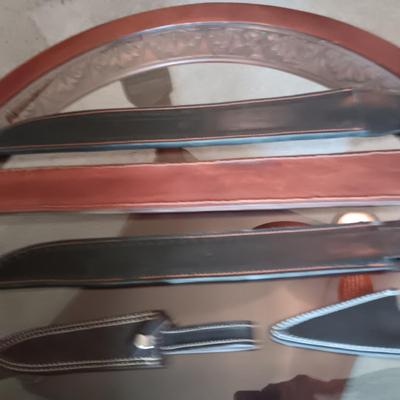 A VARIETY OF LEATHER SHEATHS