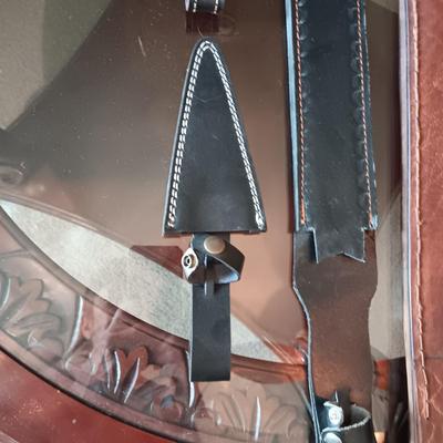 A VARIETY OF LEATHER SHEATHS