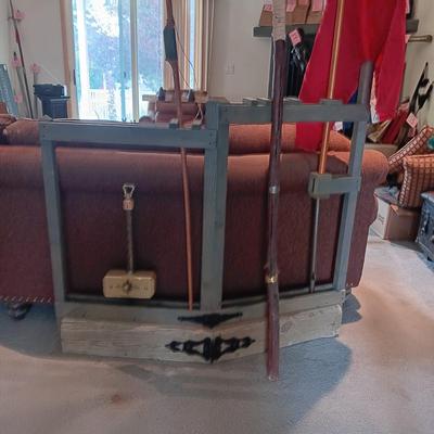 HANDCRAFTED STAND FOR SWORDS, SPEARS, BOWS, ETC AND A LARGE BOW, DRAGON SLAYER, FLAG AND POLE PLUS MORE
