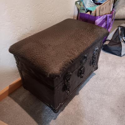 CUSHIONED TOP SMALLER TRUNK AND A RUSTIC CROSS