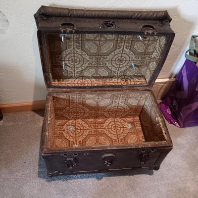 CUSHIONED TOP SMALLER TRUNK AND A RUSTIC CROSS
