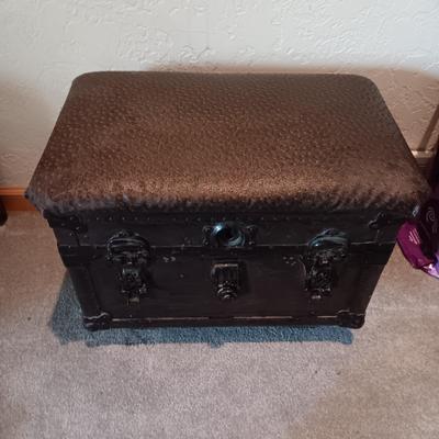 CUSHIONED TOP SMALLER TRUNK AND A RUSTIC CROSS