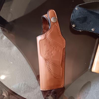 LEATHER HOLSTER AND HATCHET TYPE TOOL
