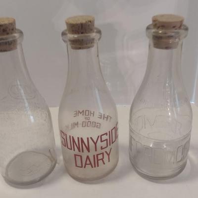 Set of Three Vintage Dairy Bottles Includes Sunnyside, Foremost, and Unmarked
