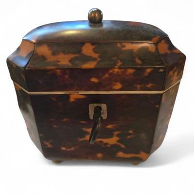 Sale Photo Thumbnail #46: 19th C. English Regency tea caddy on four bun feet. Working key and lock. Inscription of later date on inset lid. 
4.5 x 3.2d x 4.6 high