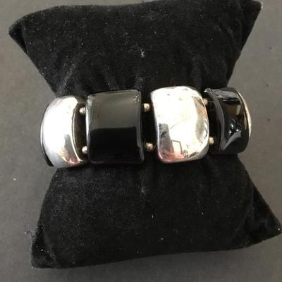 Vintage sterling, silver, and onyx stretch bracelet