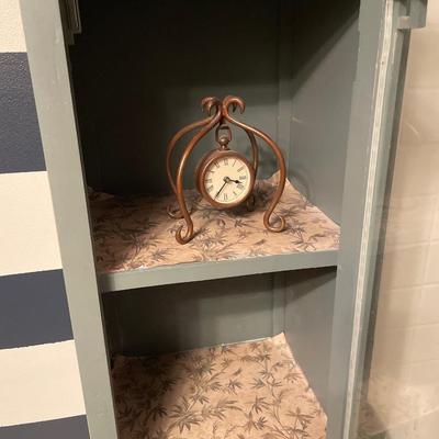 Cute painted cabinet with clock