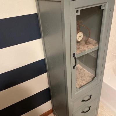Cute painted cabinet with clock