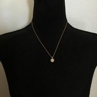 Beautiful very nice crystal rhinestone ball pendant gold tone, chain necklace. Very nice quality.